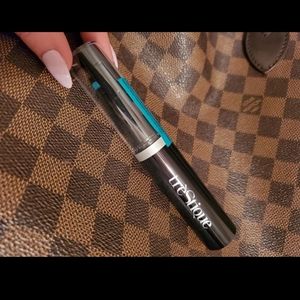 trestique mascara and curler. Not used!